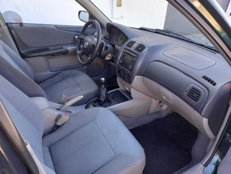 mazda 323 f bom e barato