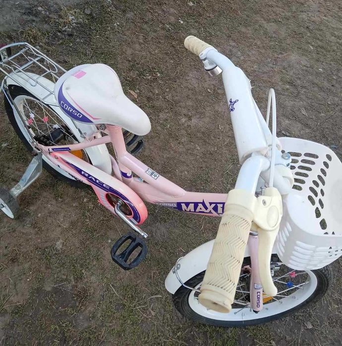 Велосипед для дівчинки на 5-9 років. Дуже зручний додаткові колеса.