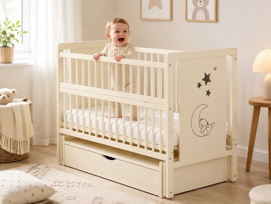 Ліжечко дитяче 120×60 з маятником, шухлядою, відкидною боковиною