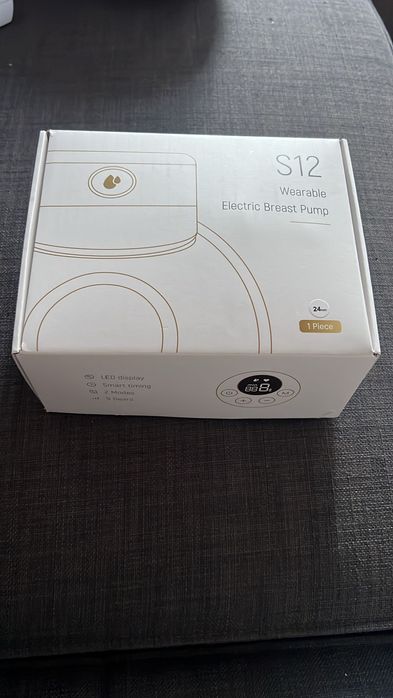 Bomba de tirar leite Novinha em folha ainda na caixa, nunca utilizada