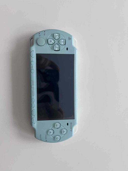 PSP 2000 Mint Green zielona, stan IDEALNY, org. ładowarka, adapter