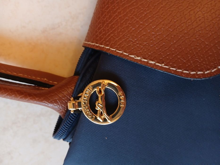 Longchamp como Nova
