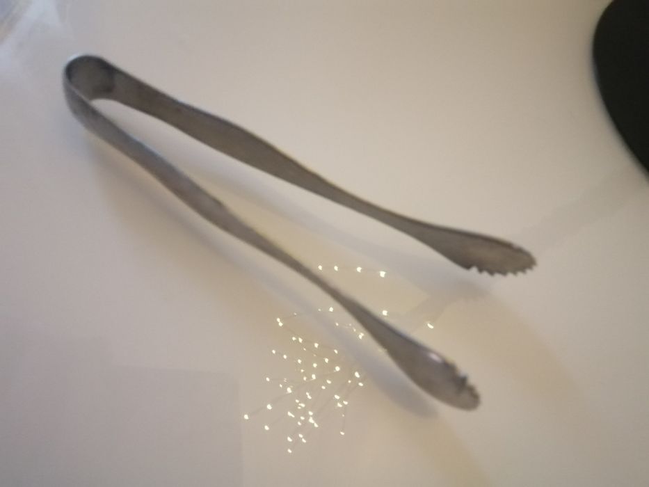 Pinça antiga em bom estado