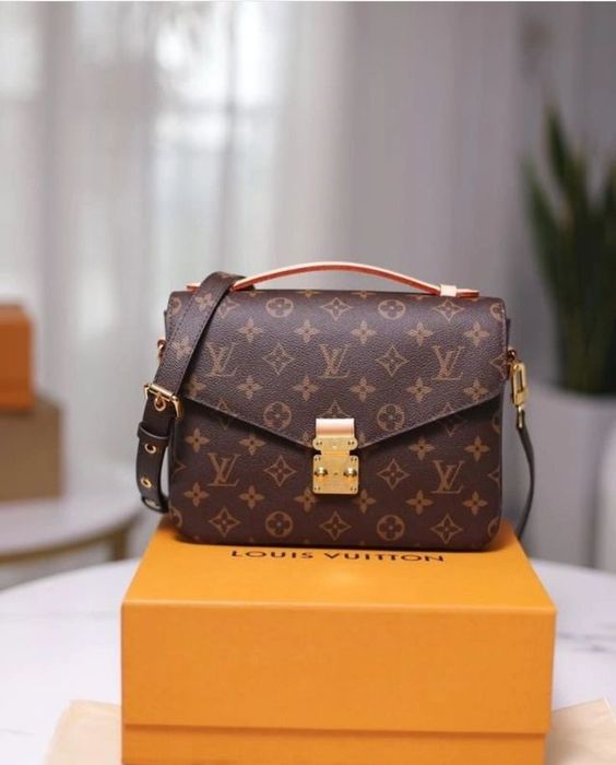Mala Louis Vuitton Pochette Metis