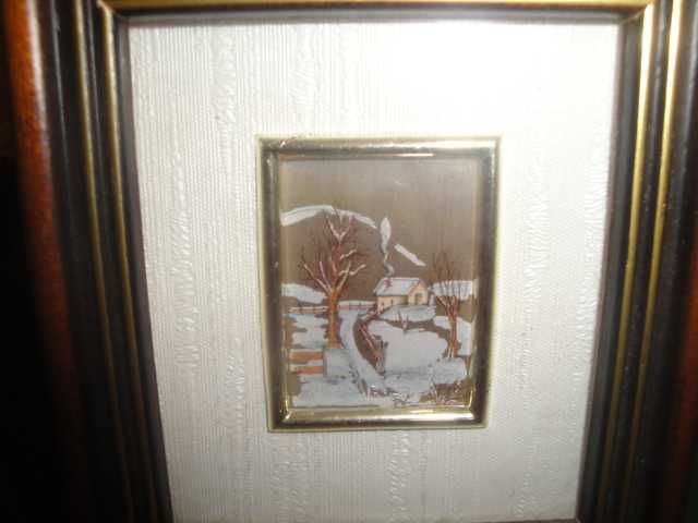 Mały obrazek w ramce z certyfikatem gwarancji wykonania