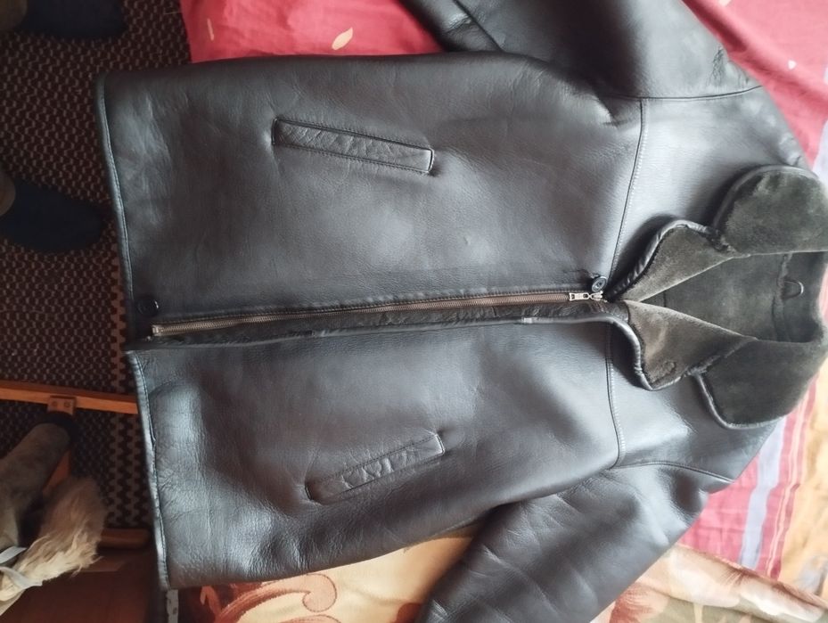 Кожанная зимняя куртка одета пару раз как новая