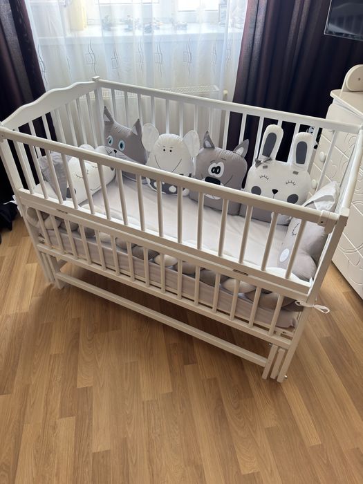 Дитяче ліжко з маятником