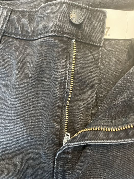 Темно сірі кльошові джинси р XL