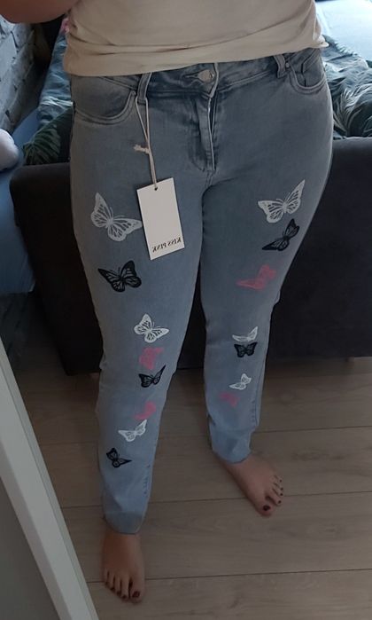 Spodnie damskie jeansowe z motylkami NOWE
