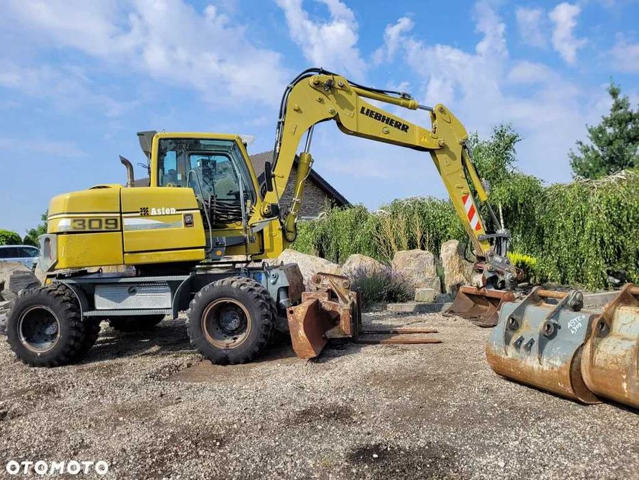 LIEBHERR 309 Klima, 4 łyżki + widły, Nowe opony! Kamera