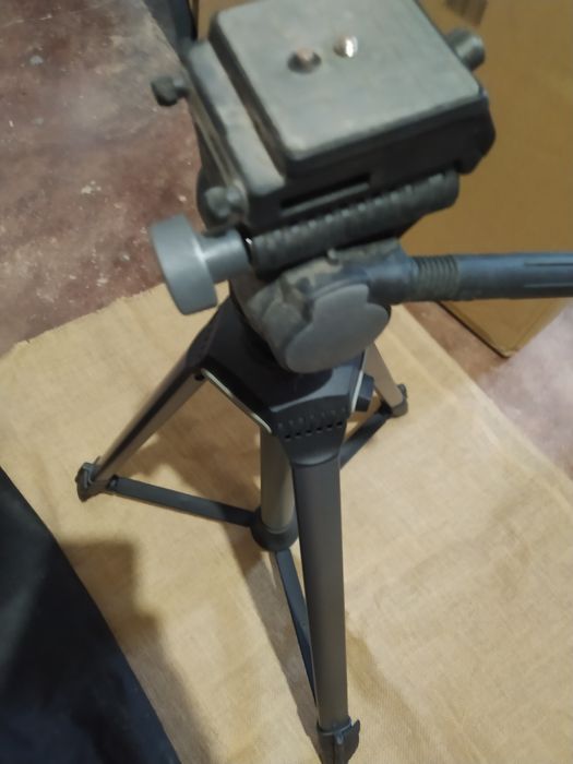 Suporte para máquina fotográfica
