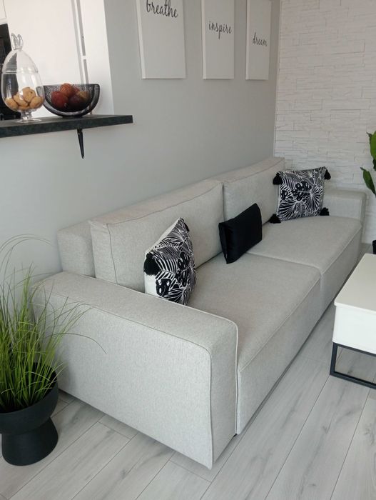 Siwa sofa rozkładana z funkcją spania