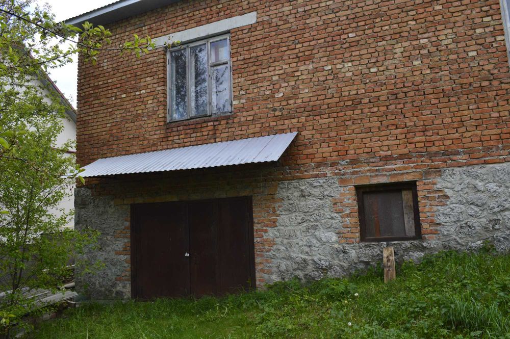 Продаж будинку 35км від Тернополя з гаражем, садом і ділянкою на 25стк