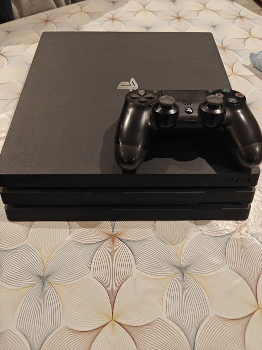 PlayStation 4 PRO jak nowe  oraz 9  super ciekawych gier