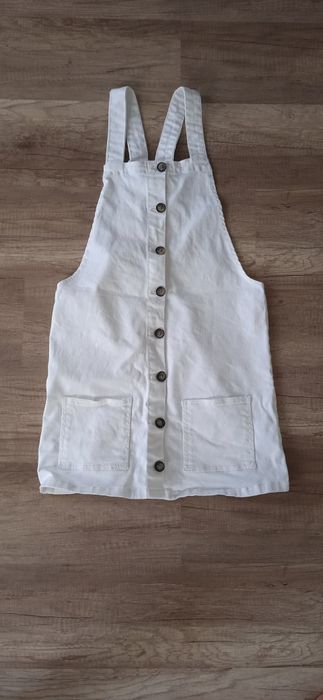 Sukienka ogrodniczka biała