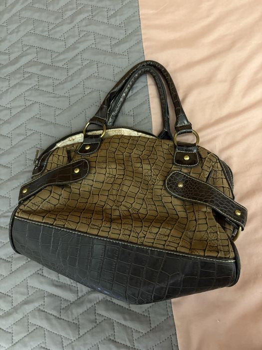 Mala vintage da guess de a muitos anos mas perfeita e nova