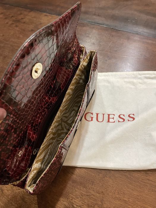 Mala clutch Guess bordeaux