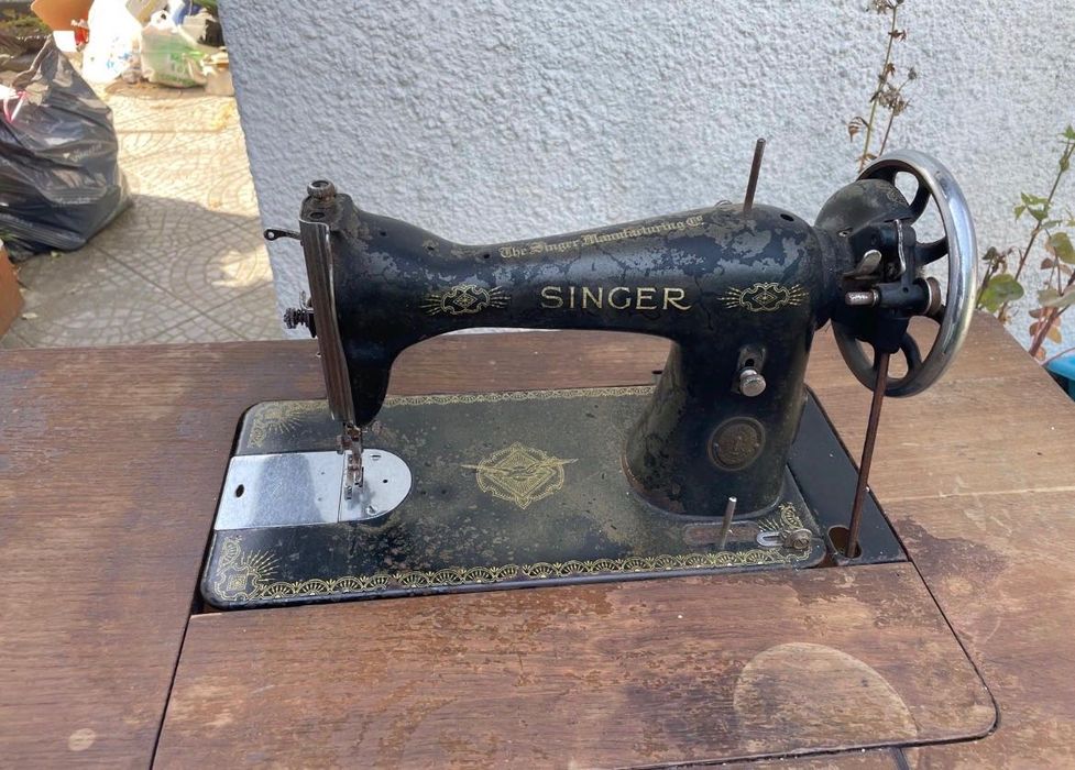 Má quina de costura Singer
