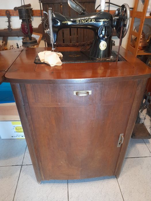 Máquina de costura singer