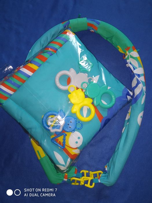 Розвиваючий килимок с погремушками ///новий