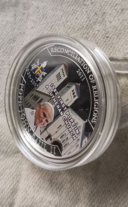 1 долар 2011 рік. " Папа Іоанн Павло ll". Срібне покриття. Тираж 1500