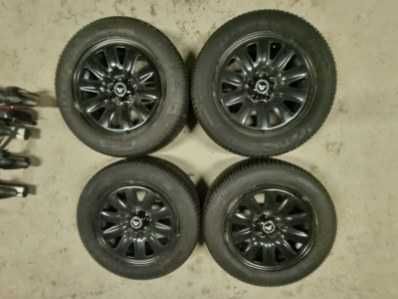 Sprzedam opony z felgami do samochodu Ford