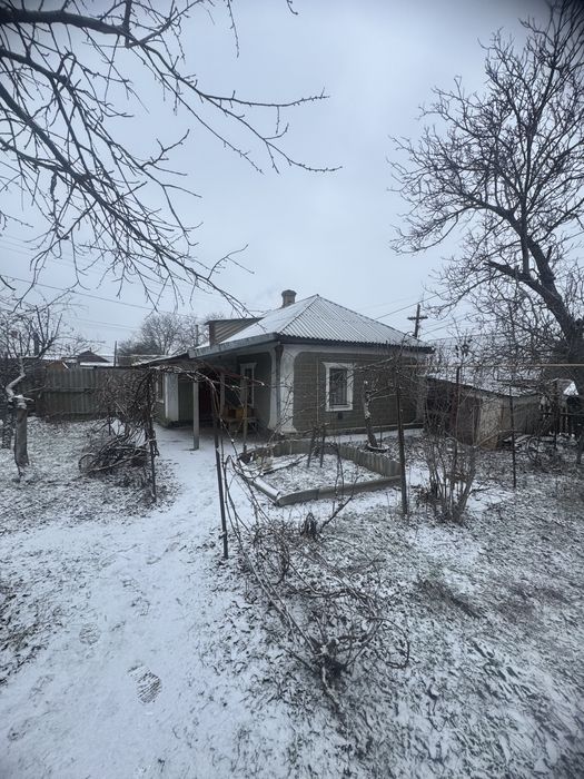 Продам пів будинку р-н. Базару