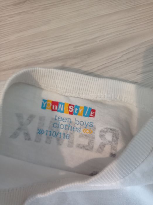 Biała bluzka z numerem 110/116