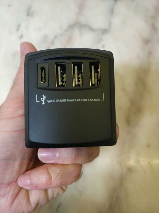 Adaptador Universal de Viagem Tomadas EU/UK/US/AU + 4 USB NOVO64354229497347122