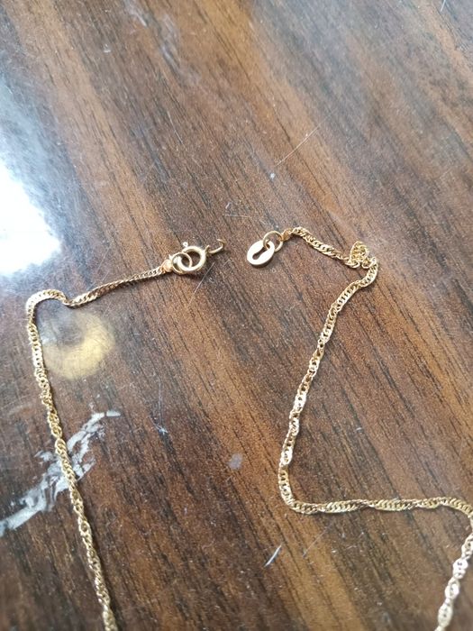 Золотая цепочка с крестиком