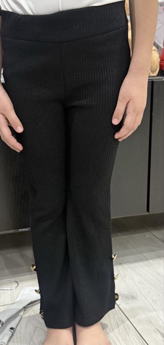 Spodnie z srebrna niktka dzwony roz 140/146