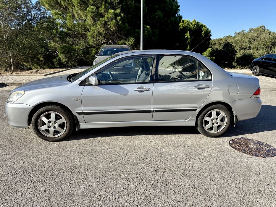 Mitsubishi Lancer 1.3 Comfort — photo 2