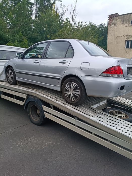 Lancer 1.6 16v automat. Maska. Czesci