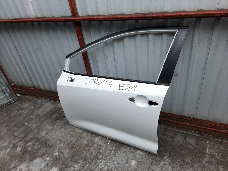 Toyota Corolla E21 18- drzwi lewy przód oryginał