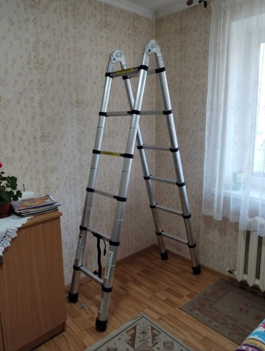 Телескопічна драбина 2,1 м компактна й зручна