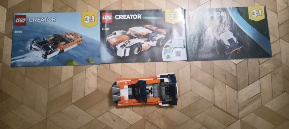 LEGO pomarańczowa motorówka z pudełkiem
