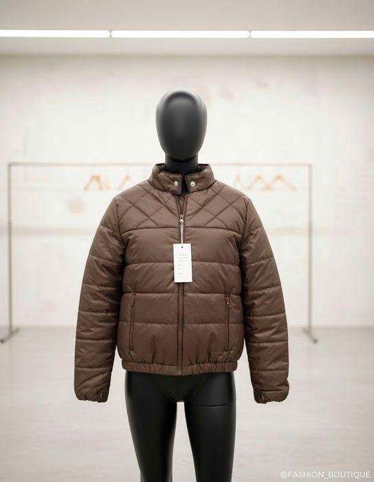 Куртка коричневого кольору, розмір с