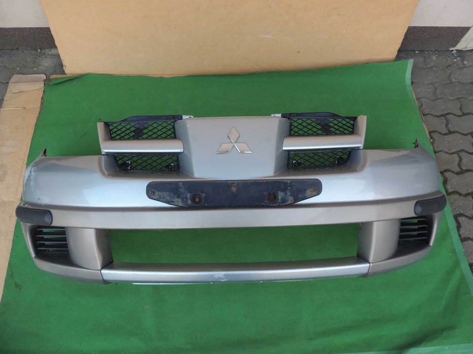 Zderzak przód przedni Mitsubishi Outlander 1 I 03,04,05,06 SREBRNY A31