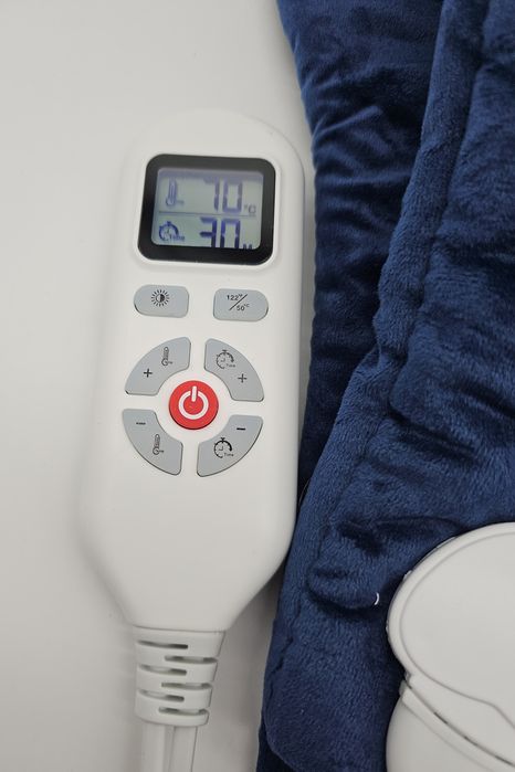 Niebieska elektryczna poduszka grzewcza do karku