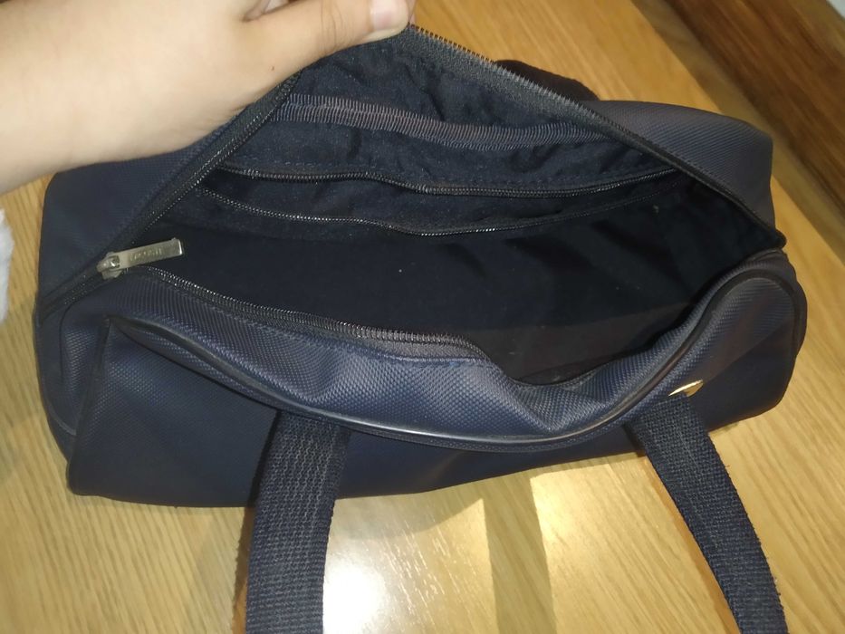 Mala Lacoste Original em muito bom estado