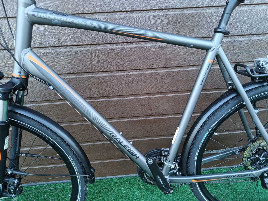 Rower 28" Raleigh 3x9 Alivio/Deore Hollowtech Hydraulika Dynamo Amortyzator Blokada Duża Rama