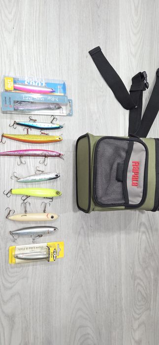 Conjunto mala Rapala e amostras spinning.