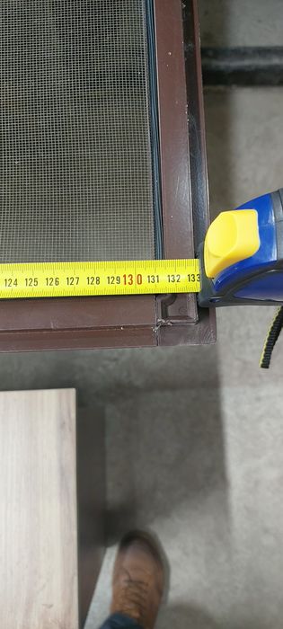 Москітна  сітка коричневого коліру