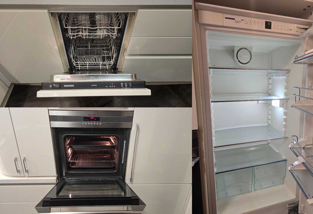 Біла кухня Г-подібної форми із вбудованою технікою