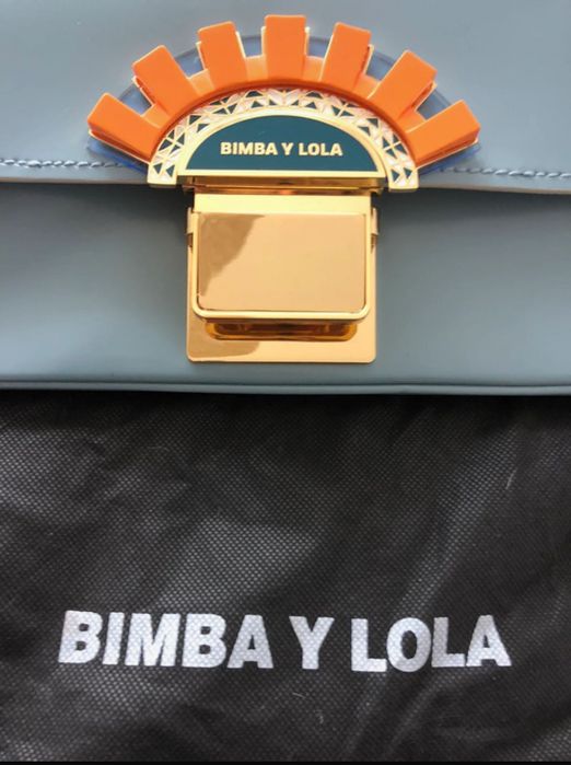 Carteira de ombro  / clutch couro envernizado Bimba y Lola