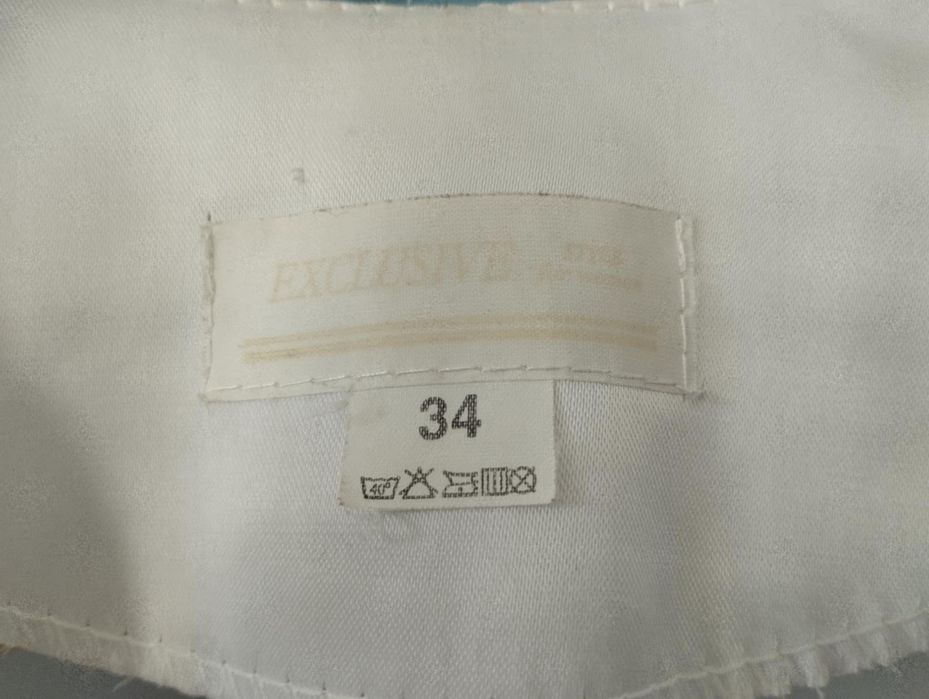 Białe bolerko dziewczęce