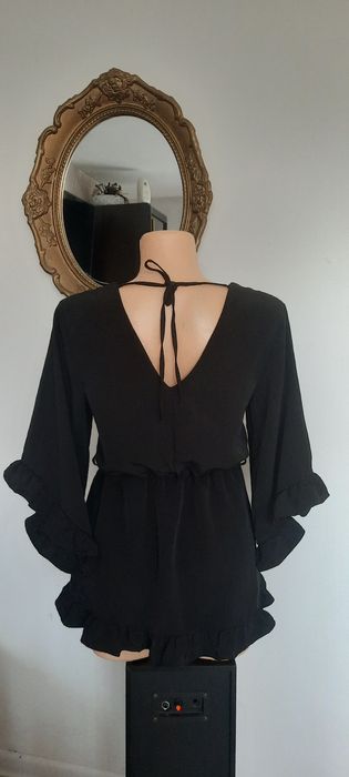 Śliczna bluzka z falbanką-River Island