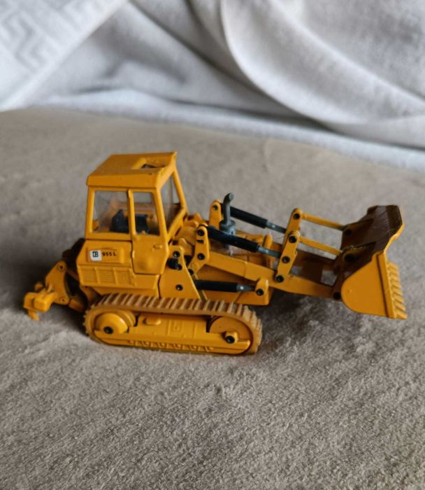 Miniaturas de máquinas retro-escavadoras Caterpillar