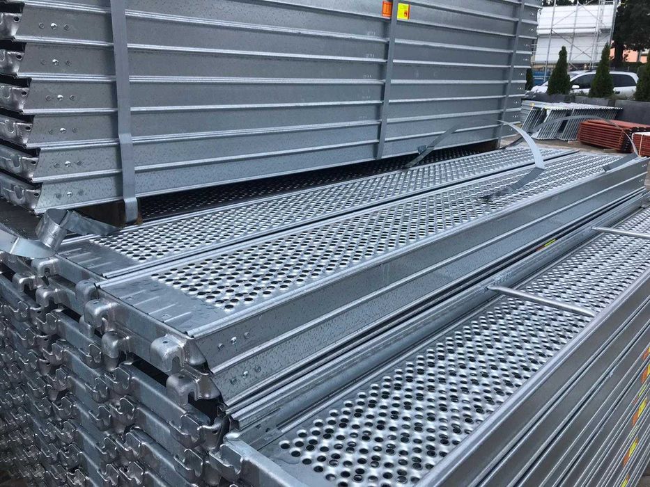 Rusztowanie elewacyjne stalowe typ Baumann Nowe 8,3x12,28=100 m2 kompletne, podest stalowy 3,07 m