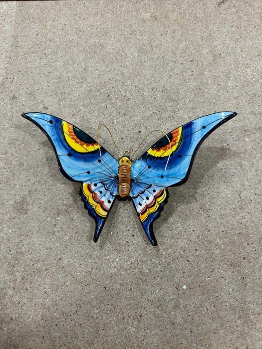 Andorinha em cerâmica louça